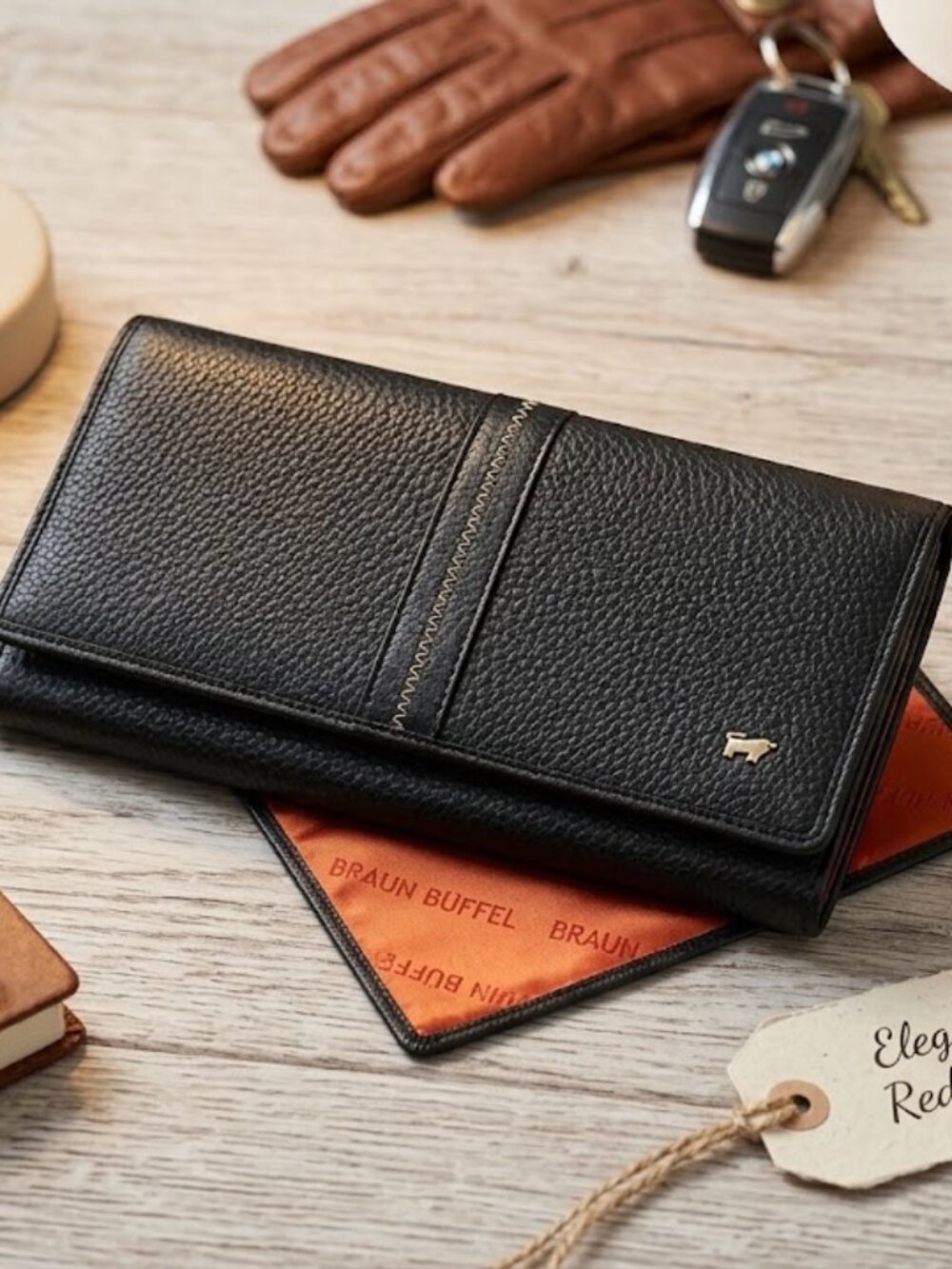 Braun Büffel Black Pebbled Leather Long Continental Wallet with Vibrant Orange L